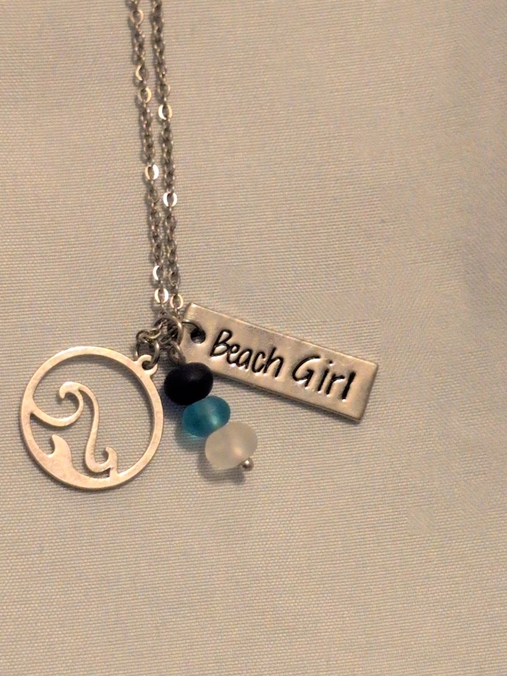 Beach Girl Silver Pendant Necklace with Blue and Black Beads
